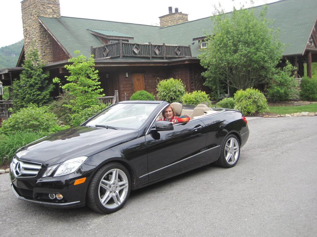 Janet in her car ready to get on the road again