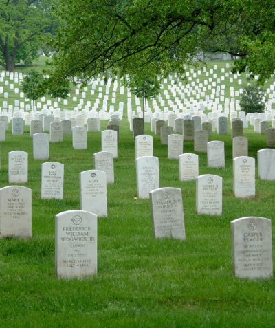 Rows of white headstoness honoring the fallen at Arlington