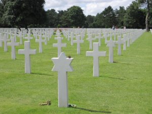 Marble headstones in the shape of crosses and stars of david to honor the fallen