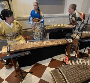 KIMONO-CLAD LADIES PREPARE TO PLUCK THEIR KOTOS